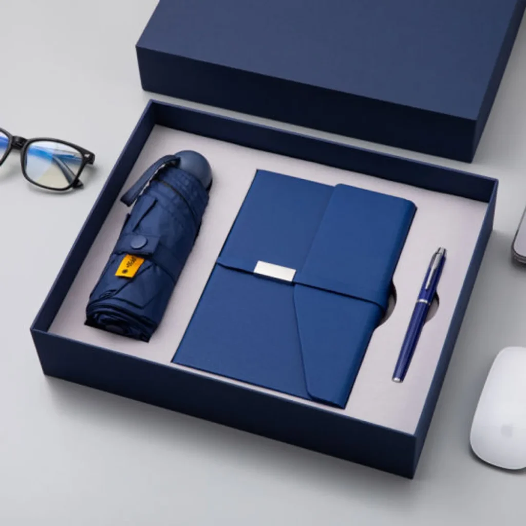 A branded corporate gift set with umbrella, notebook and pen